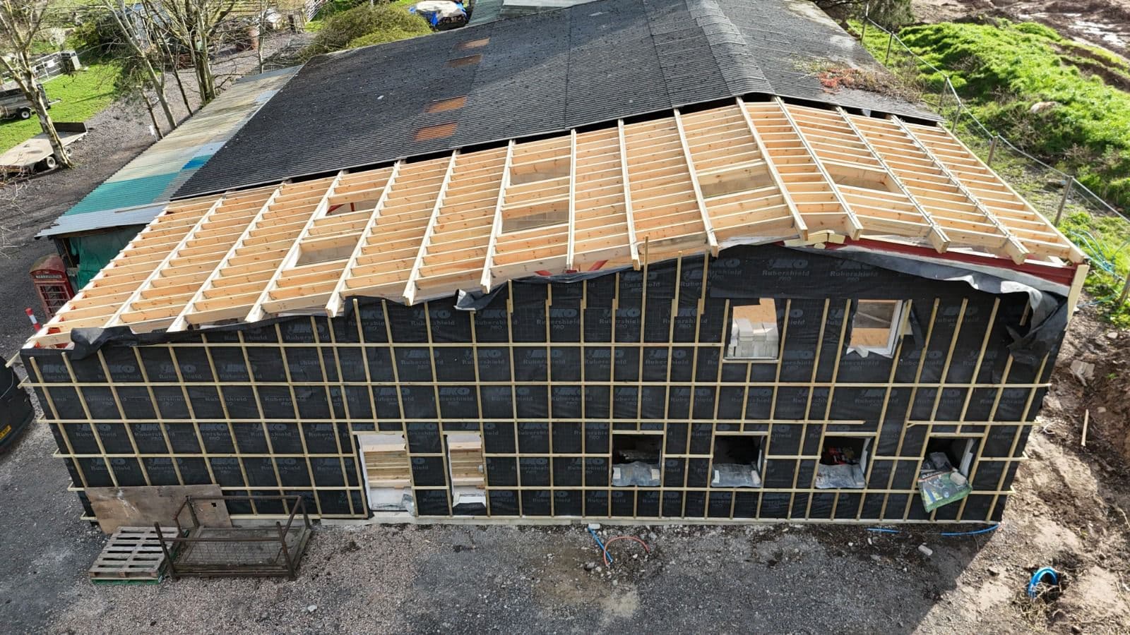 Aerial drone shot of barn conversion roof under construction