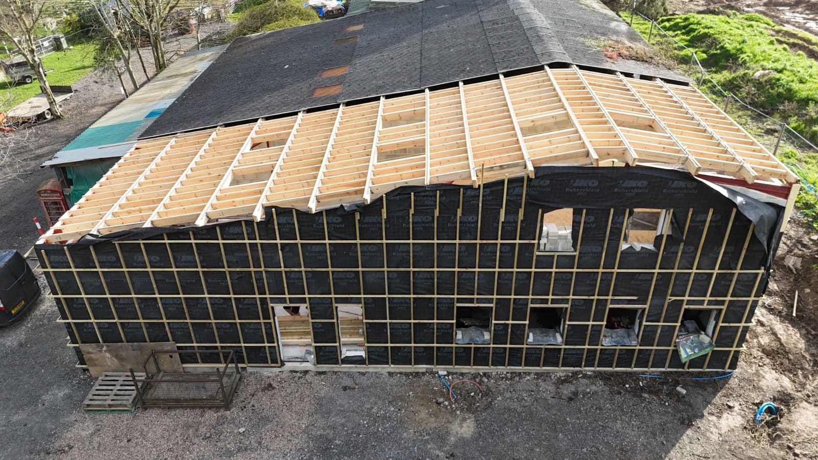 Drone shot of barn conversion roof work