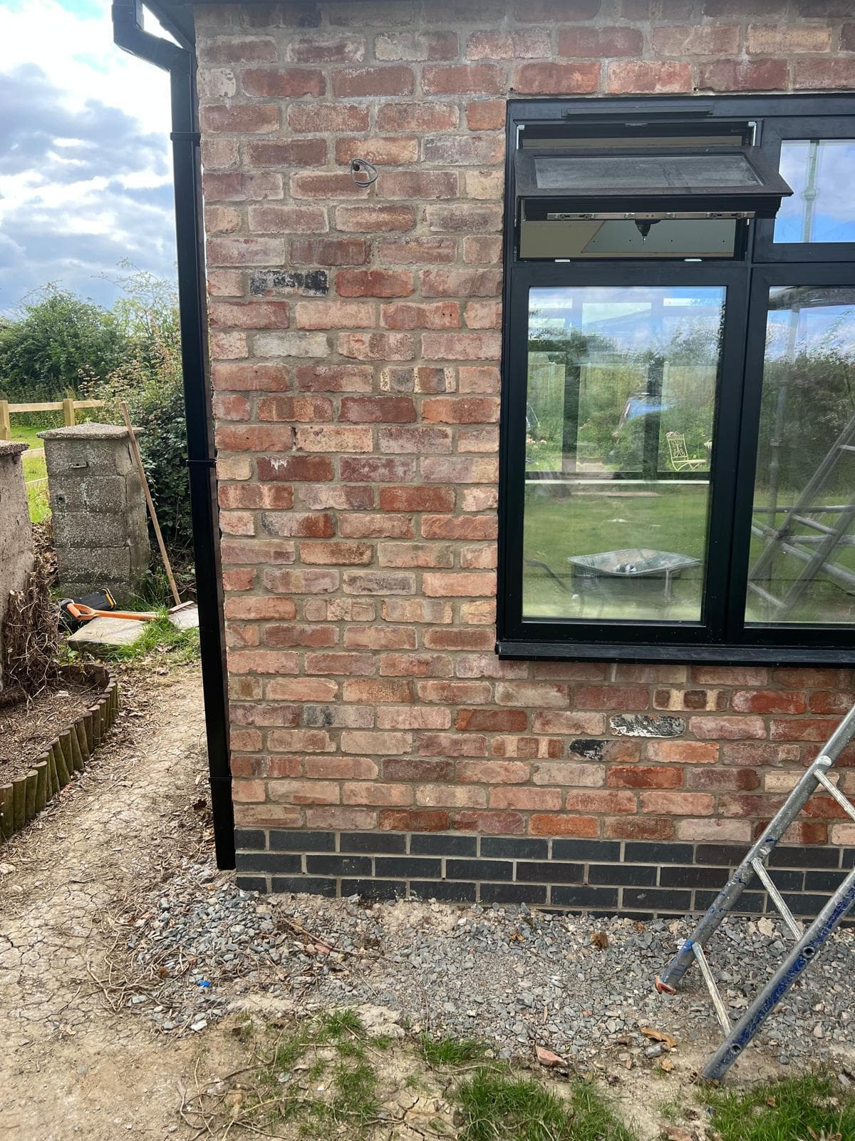 Brick extension wall under construction