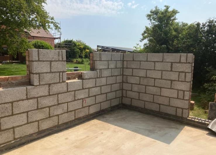 Blockwork walls of an extension under construction