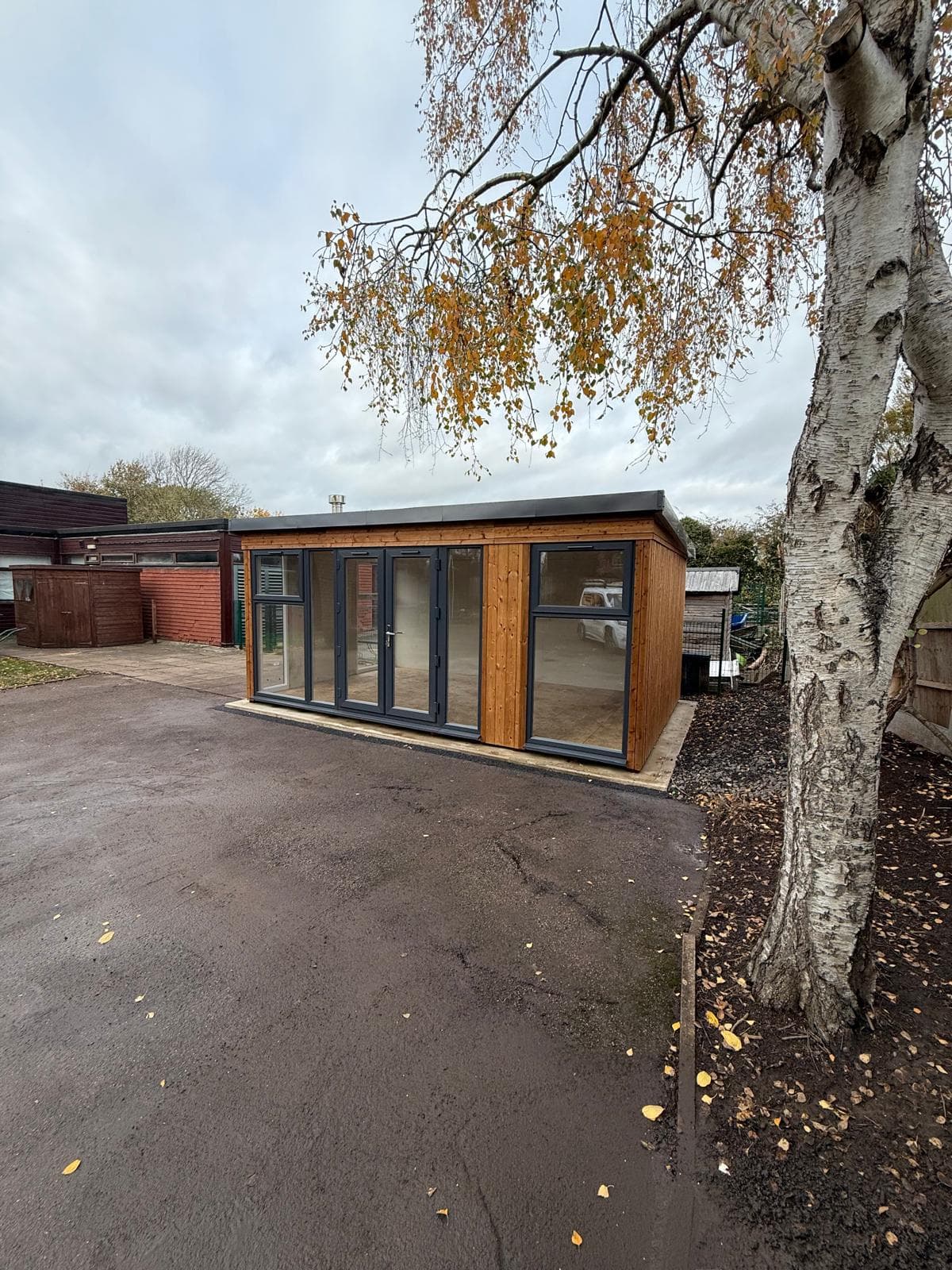 Timber clad garden room with bifold doors