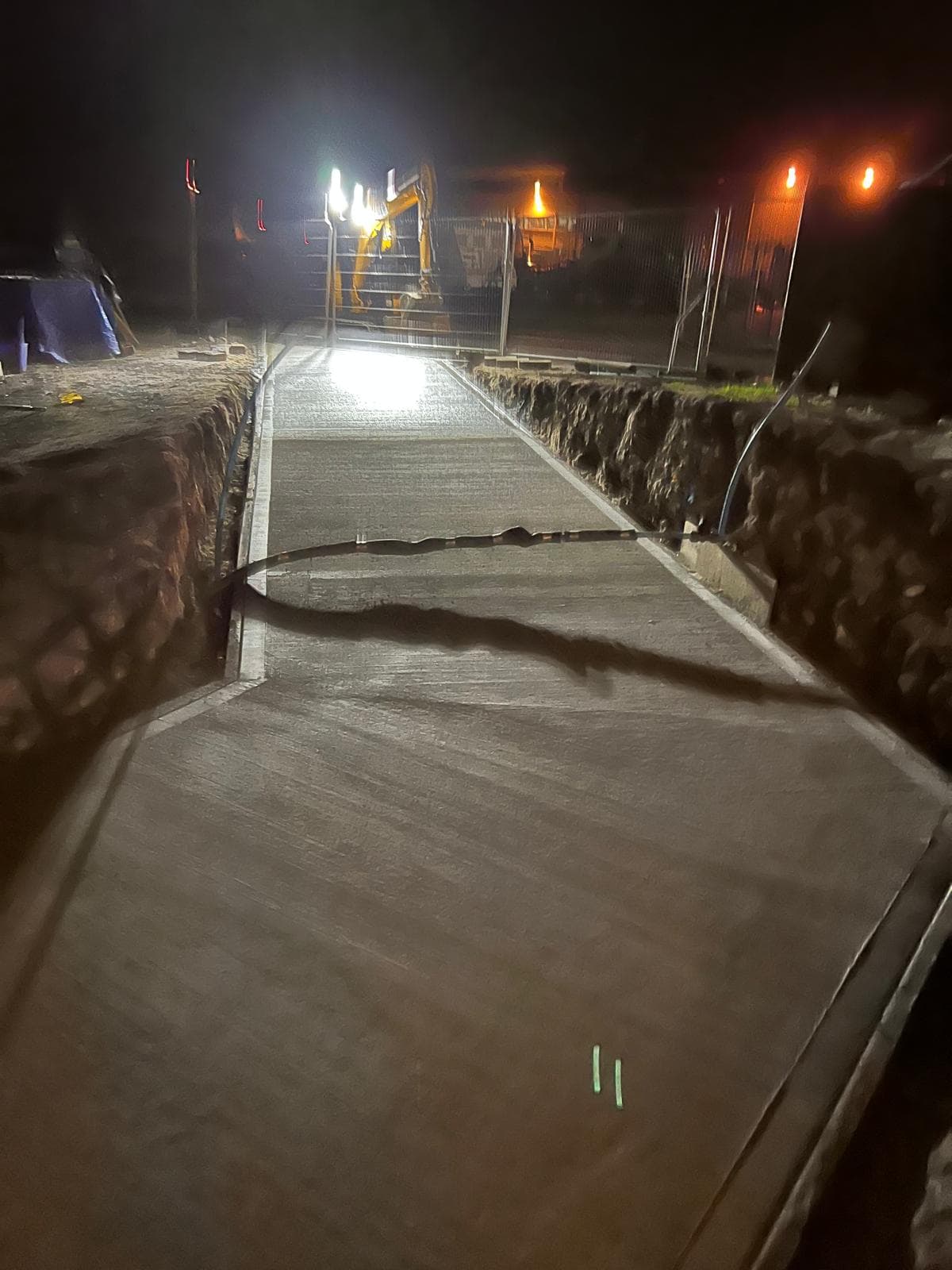Night-time concrete road pour
