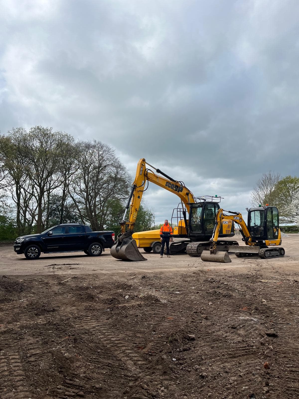 Scoop Contracts team with plant and vehicles