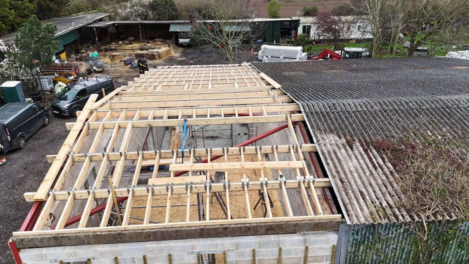 Timber frame flat roof aerial progress