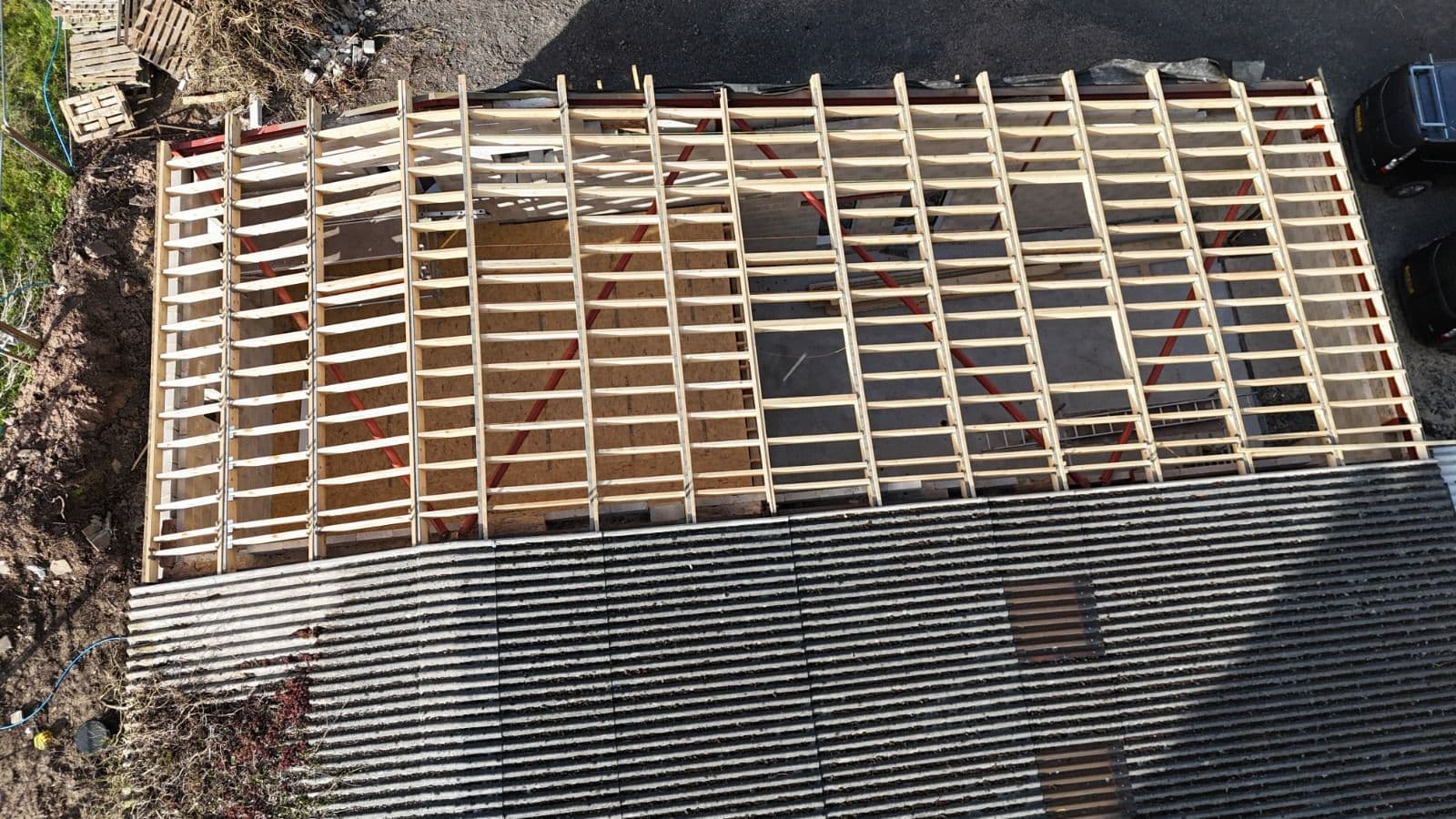 Aerial drone view of flat roof timber structure