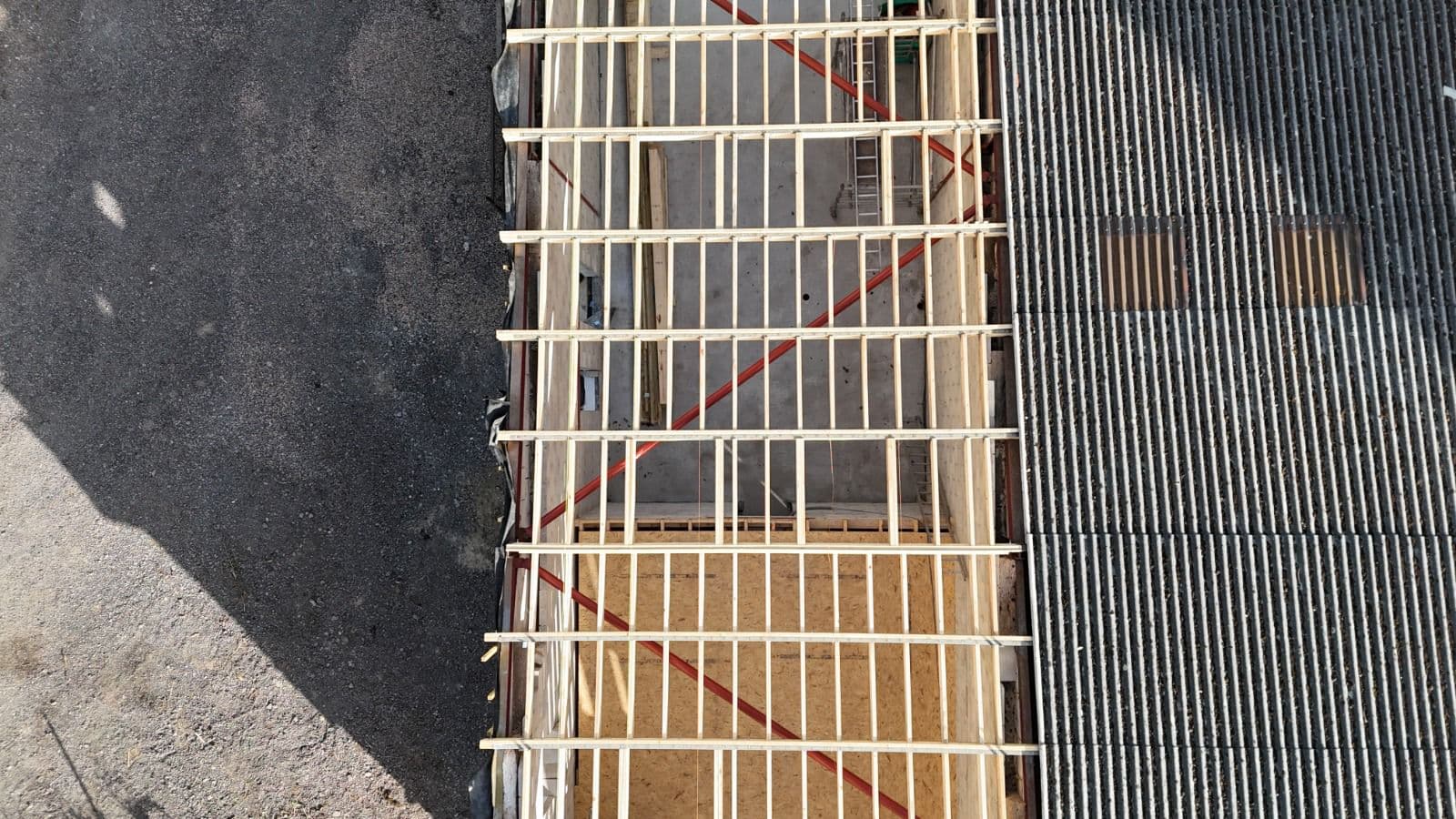 Aerial view of timber frame flat roof construction